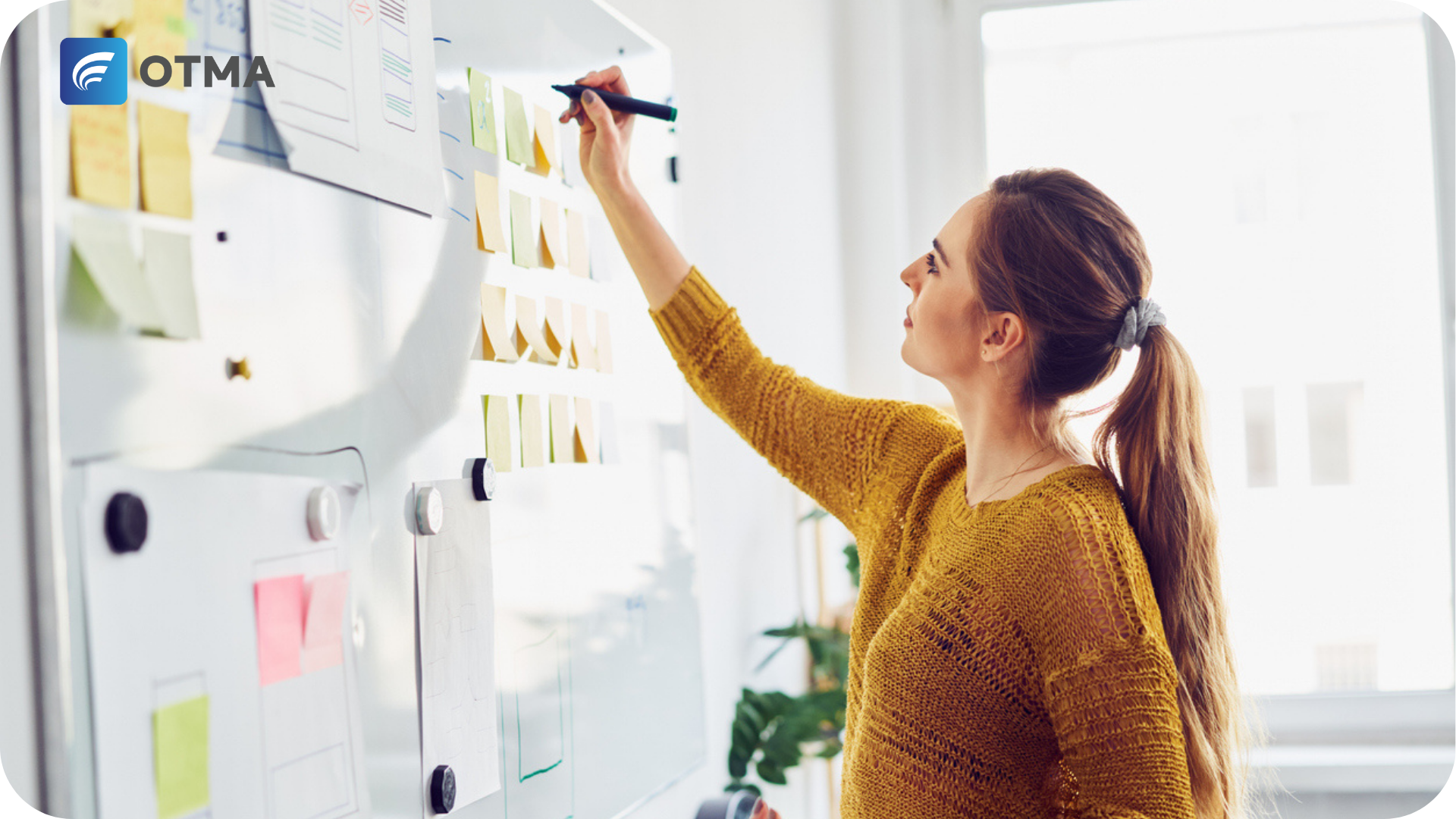 A professional planning on a whiteboard for Level 7 Apprenticeship Funding