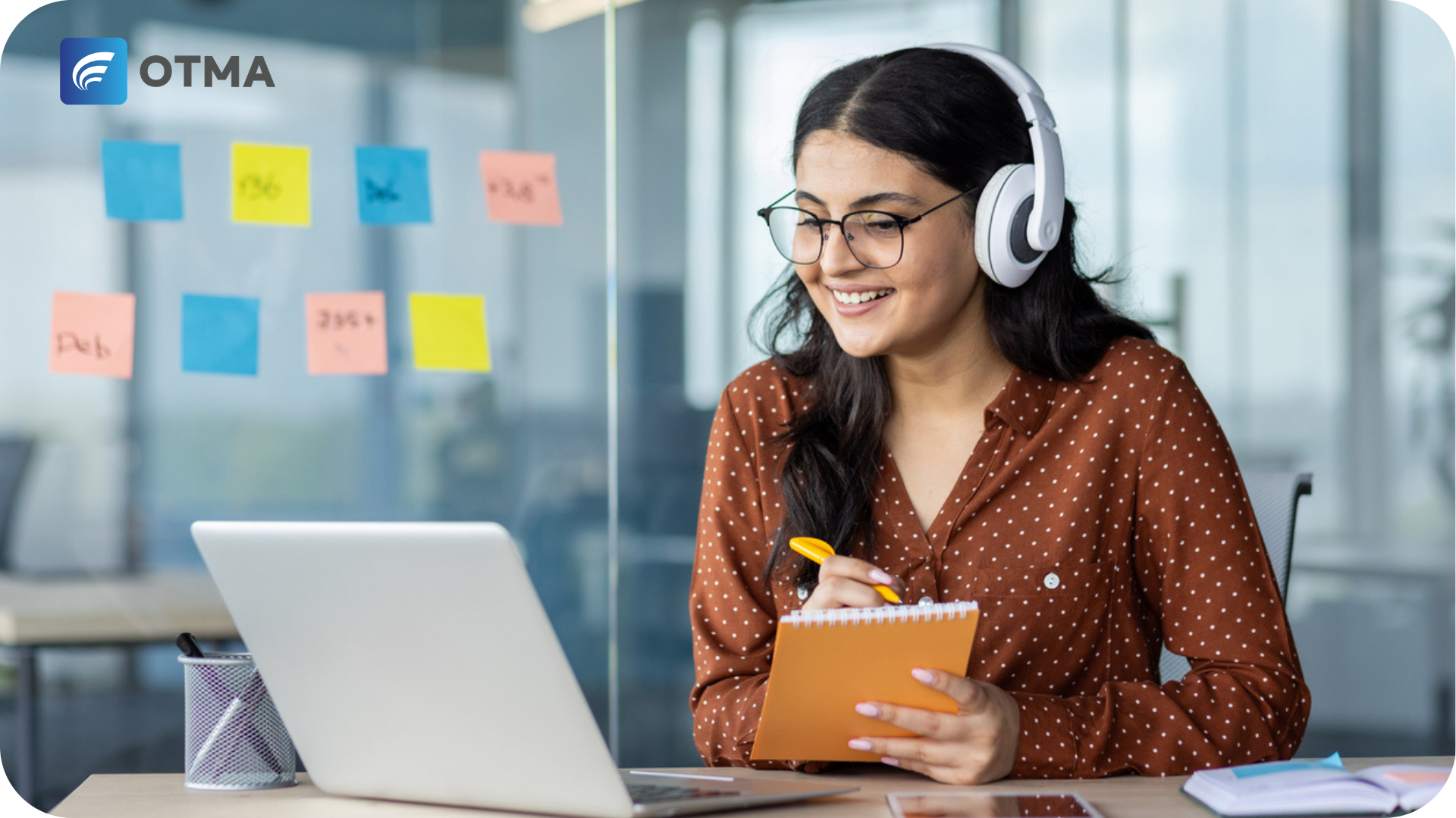 Level 4 Apprenticeships - in completion by a professional working at her desk