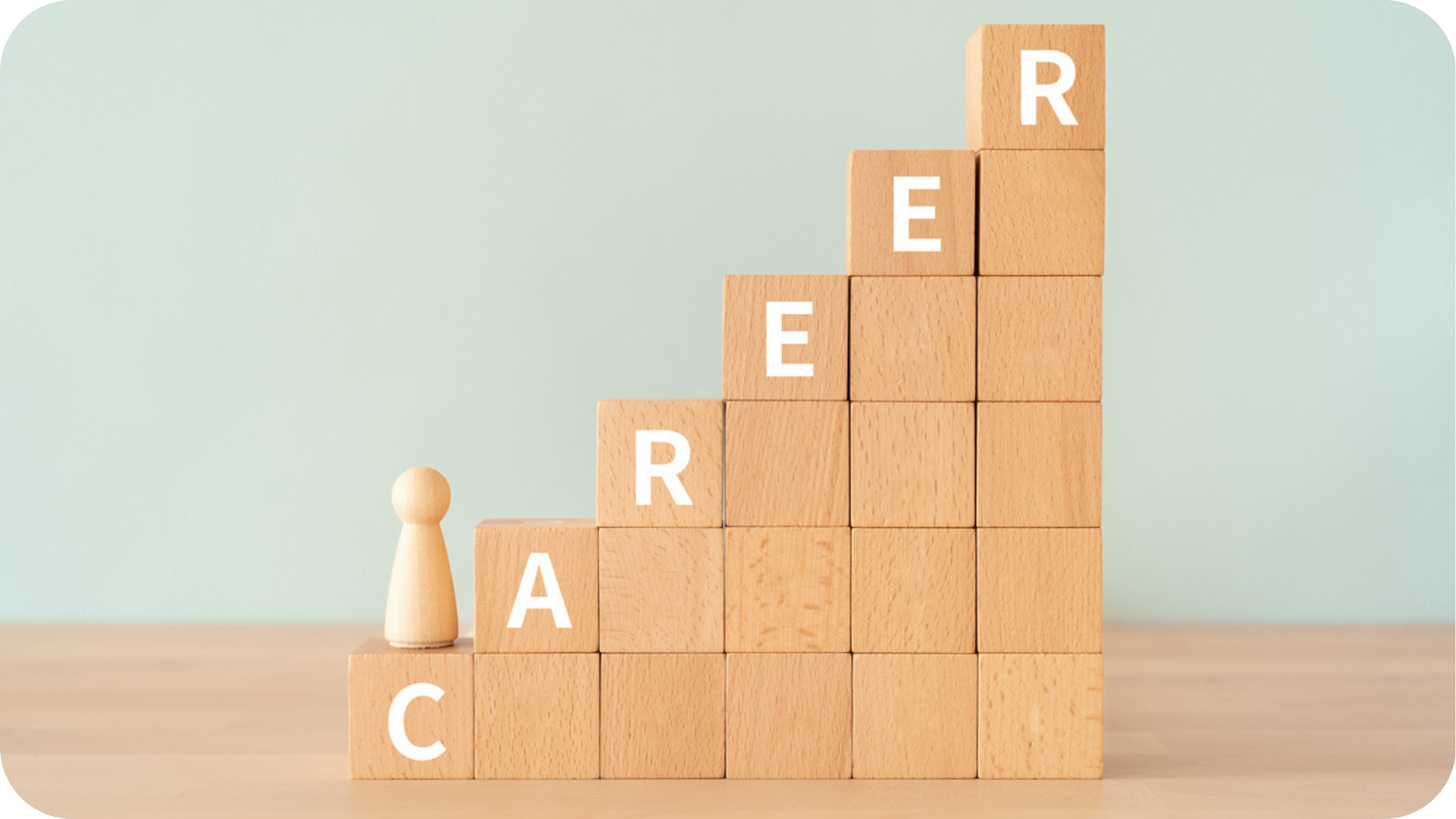 Career Progression shown by the word career across wodden block rising to the top